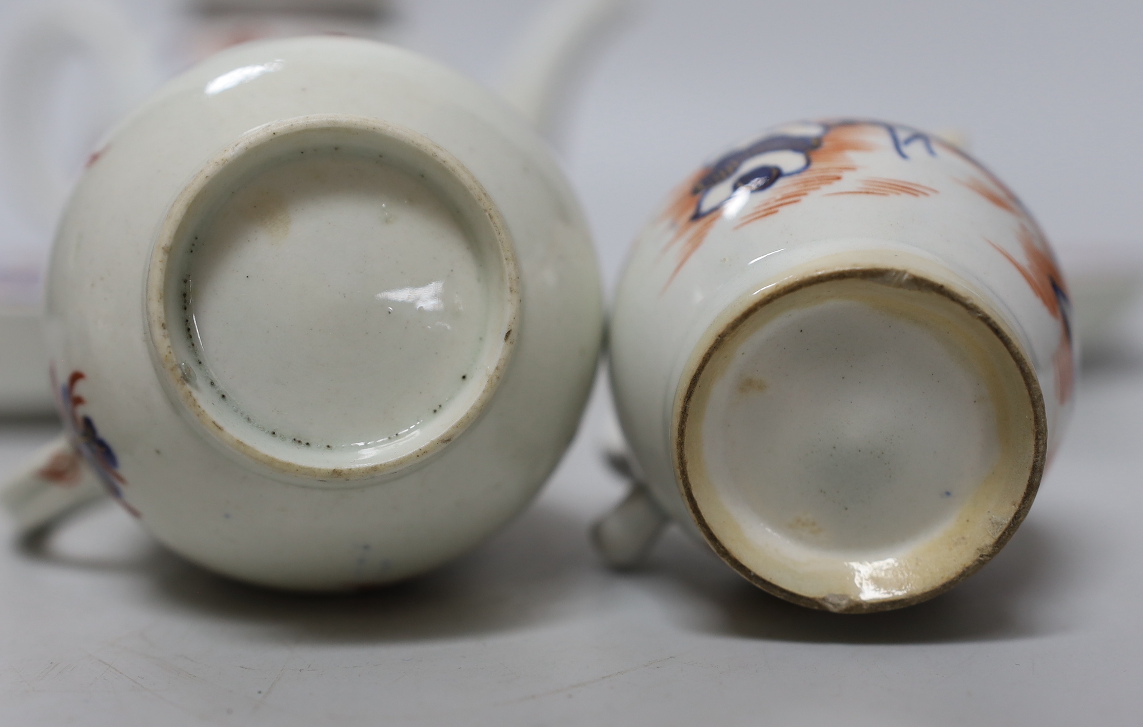 A group of Lowestoft Imari teawares, c.1770, including a Redgrave two bird pattern teapot and cover, tea bowl and two saucers, a Dolls House pattern sparrow beak cream jug and teabowl with saucer and a further sparrow be